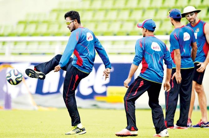 Bangladesh all-rounder Shakib Al Hasan plays football with his teammates during a practice session at the Sher-e-Bangla National Cricket Stadium in Mirpur yesterday. Pics/AFP