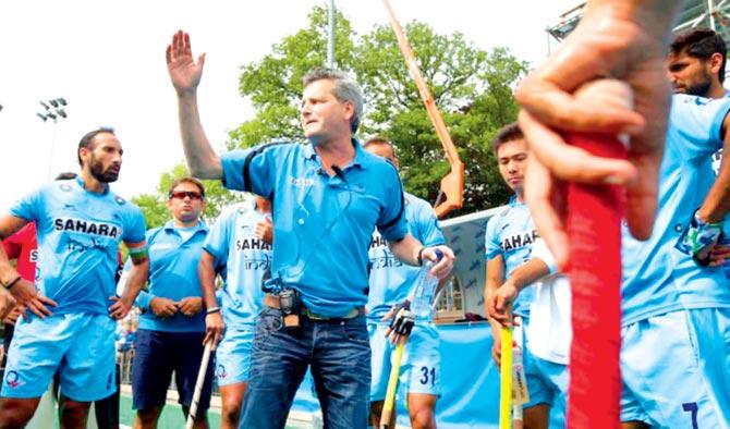 India coach Paul van Ass with his team in Antwerp, Belgium