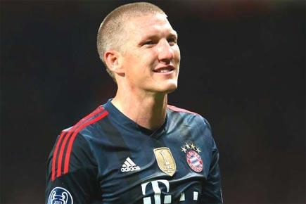 Schweinsteiger motivated by Bayern's bid for four in a row