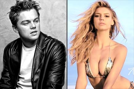 Leonardo DiCaprio, Kelly Rohrbach get cozy at party