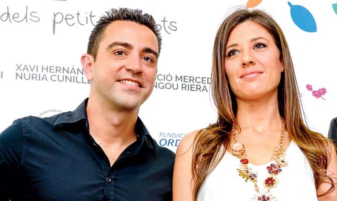 Xavi Hernandez and Nuria Cunillera. Pic/Getty Images