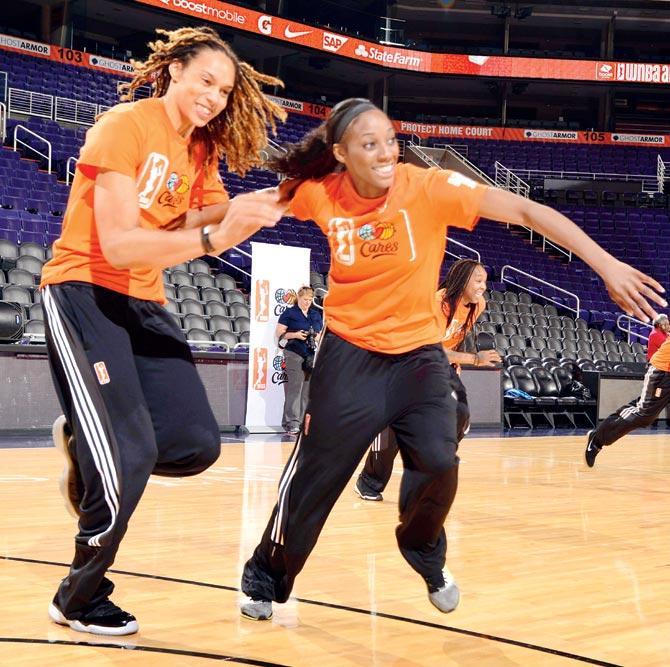 Former couple: Brittney Griner (left) and Glory Johnson during an All-Star Cares event held in Phoenix, Arizona last year. Pic/AFP
