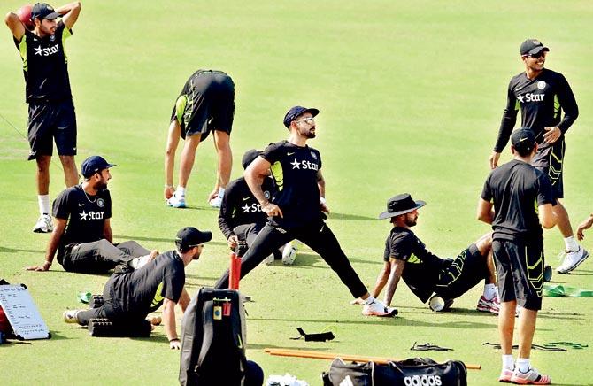 Test captain Virat Kohli (centre) during a training session with his India teammates at Eden Gardens in Kolkata yesterday. Pic/PTI