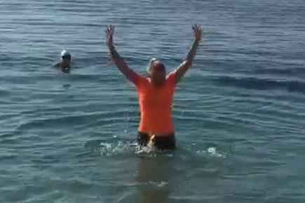 Tennis ace Caroline Wozniacki takes a plunge into the ocean