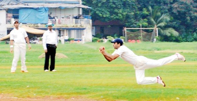 A fielder takes a catch at a Young Friends vs Shivaji Park Gymkhana Kanga League fixture at Shivaji Park in 2012. File pic