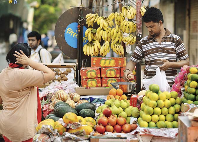 India’s central bank is expected to cut interest rates for a third time in five months when it meets this week, confident that inflation is stable enough to weather the monsoon. Pics/AFP