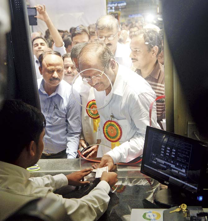MP Gopal Shetty purchases a ticket after inaugurating ticket windows at the Andheri station on Monday