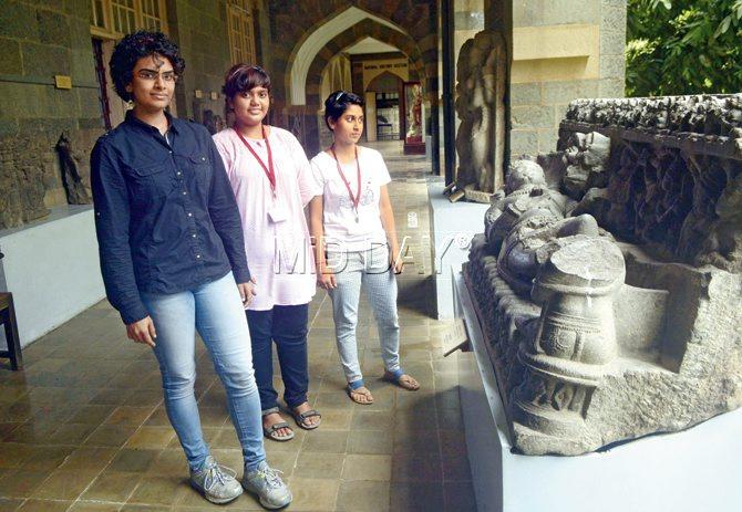 (From left) Meghna Saha, Saniya Shaikh and Rhea Chauhan at the Sheshshayee Vishnu sculpture at CSMVS. Pic/Pradeep Dhivar