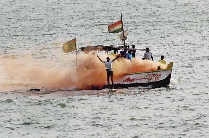 Mumbai Fire Brigade operators and flood rescue team members participating in a drill at Marine Drive, recently. Pic/PTI