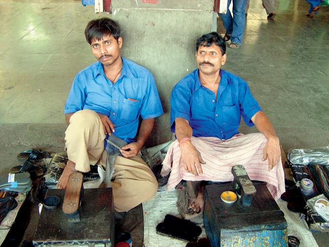 With commuters having no space to breathe, how can railway stations accommodate more shoeshine boys on their premises? File pic for representation