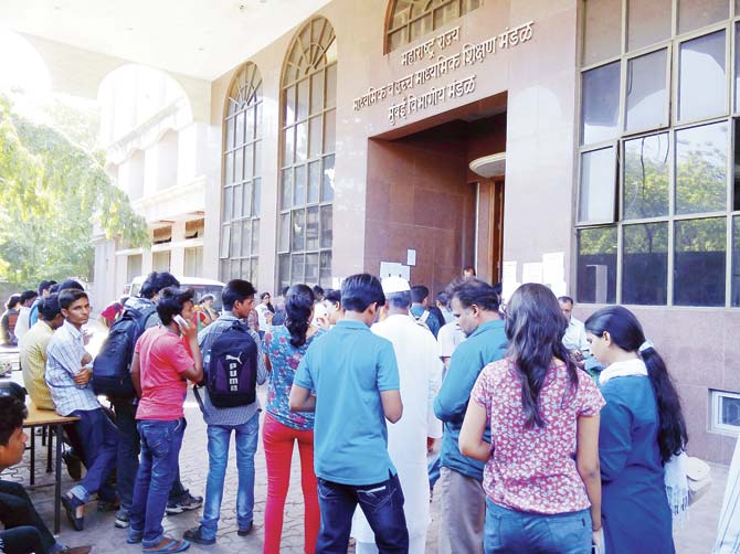 Students at the SSC Board office in Vashi on Monday. Many top scorers say that they are not happy with the results