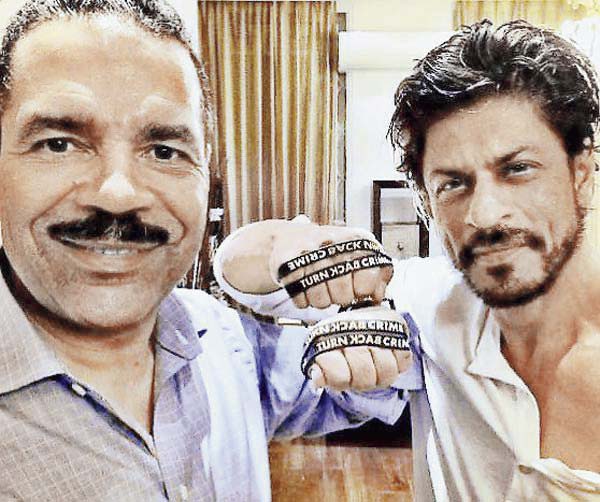 Ronald K Noble with Shah Rukh Khan