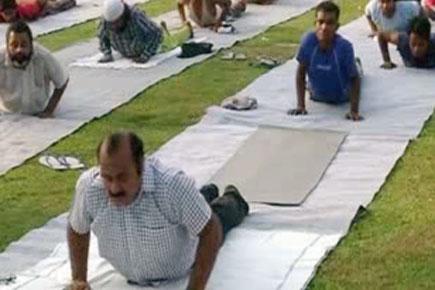 Inmates of Tihar jail practice yoga in New Delhi