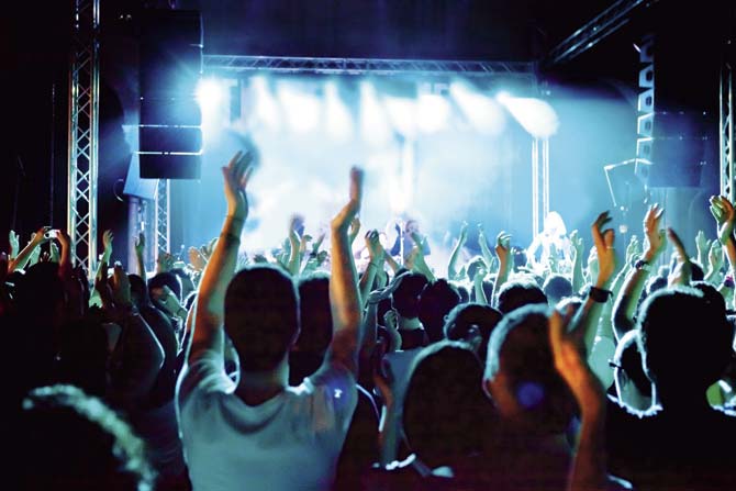 I’m not even the most rock-n-roll person on Earth, and yet, there’s something especially dismal about how you put your hands up when the DJ tells you to, and you jump when the song implores you to. Representation pic/Thinkstock