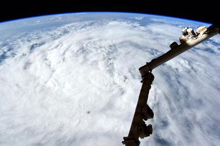 Cyclone storm over Mumbai to Himalayas, seen from space