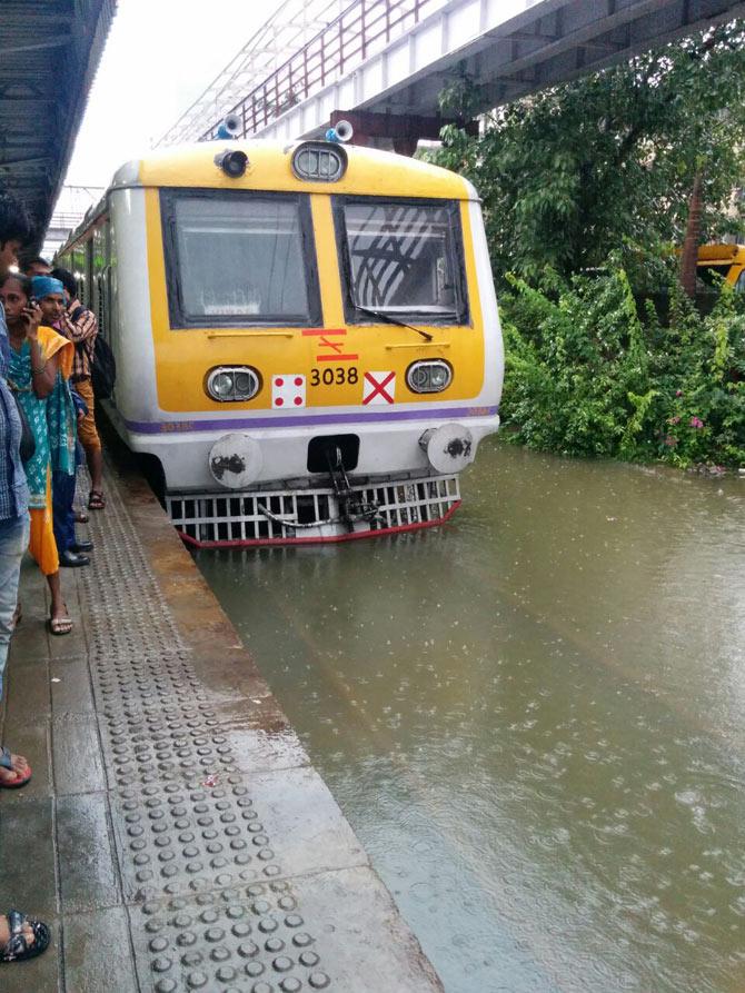 The train tracks at Matunga Road railway station were also flooded