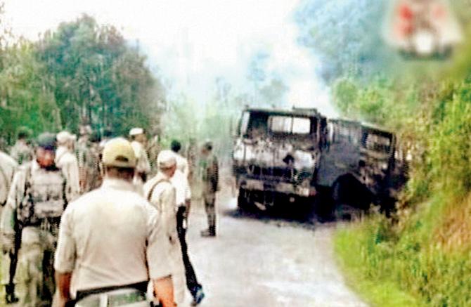 Ambushed: Using landmines, rocket-propelled grenades, and automatic weapons, a group of insurgents ambushed a military convoy in Manipur. pic/PTI