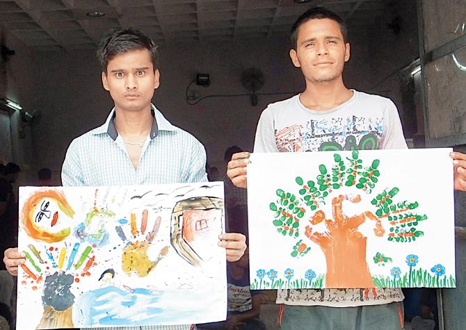 Paintings created by inmates at the workshop
