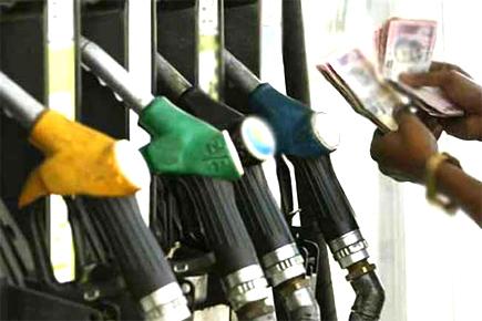 Petrol price hiked by 64 paise; diesel cut by Rs 1.35