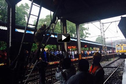 Heavy rains continue to lash Mumbai; local train services hit