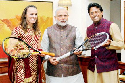 Leander Paes, Martina Hingis gift PM Narendra Modi autographed racquets