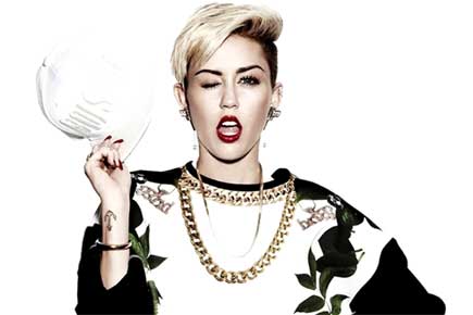 Miley Cyrus plays Kim Kardashian's stylist in cryptic image