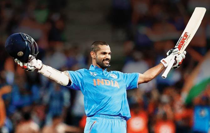 Shikhar Dhawan celebrates his second World Cup ton yesterday. PIC/Getty Images 