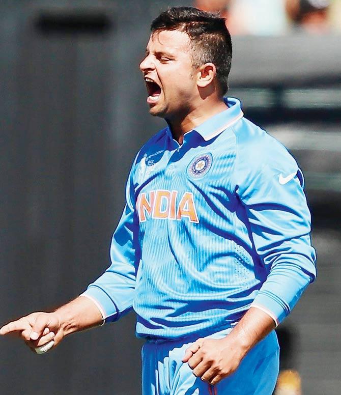 Suresh Raina celebrates the wicket of Ed Joyce at Seddon Park yesterday. The off-spinner finished with 1-40 in 10 overs. PIC/Getty Images