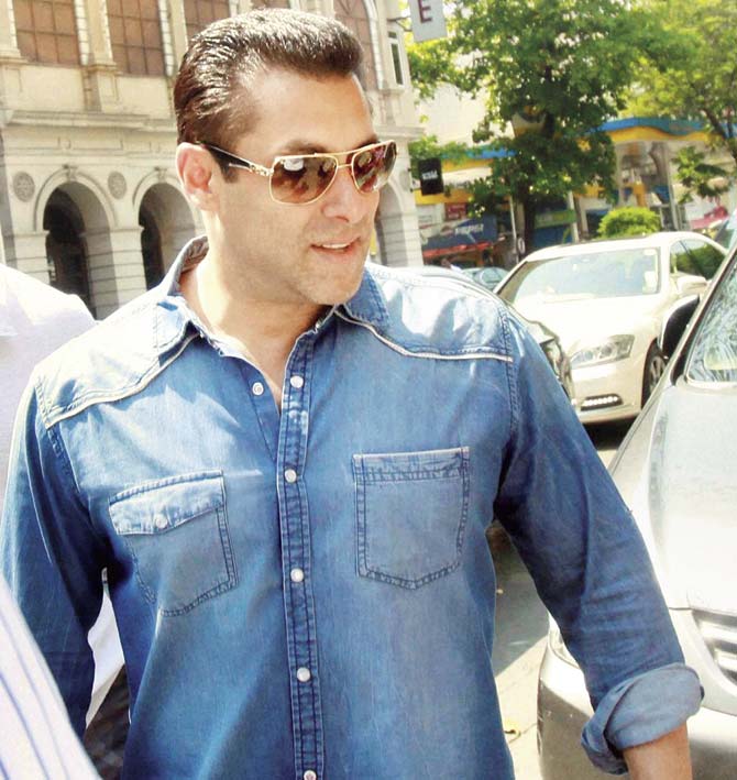 Salman Khan outside the Bandra Sessions court yesterday. He has been asked to be present for the hearing today as well. Pic/PTI