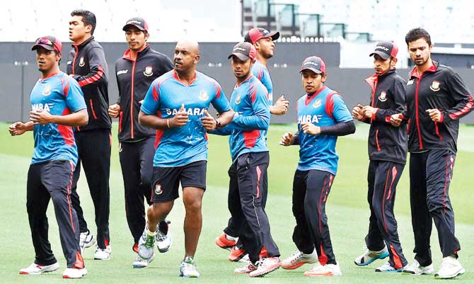 Bangladesh players warm-up during a practice session in Melbourne on Tuesday. Pic/AFP