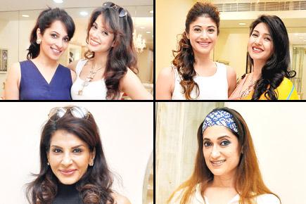 A bevy of Bollywood beauties at a fashion store' s new collection launch
