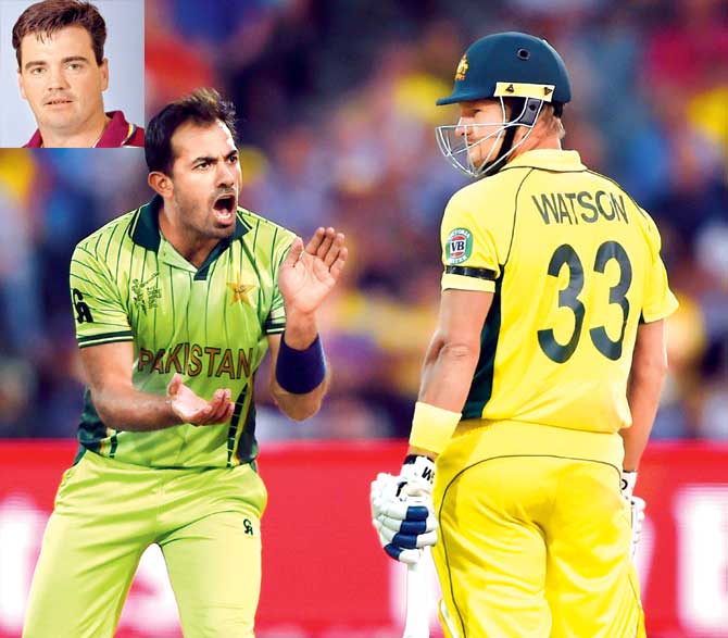 Pakistani cricketer Wahab Riaz  gives Australian batsman Shane Watson some lip service during their World Cup quarter-final clash at the  Adelaide Oval on March 20, Pacer Riaz claimed two wickets, but Watson stayed unbeaten on 64 (Pic/AFP). Inset: Joe Dawes