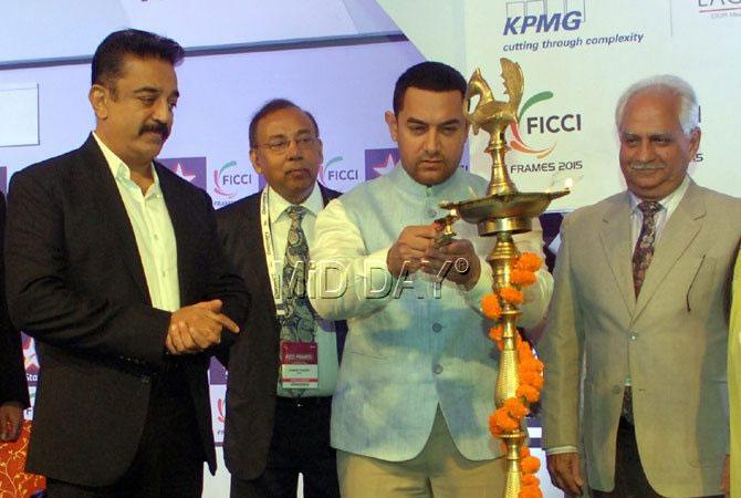 (L to R) Kamal Haasan, Aamir Khan and Ramesh Sippy during the inaugural session of FICCI Frames 2015 held at Renaissance Hotel, Powai in Mumbai on 25/03/2015. Pic/Shadab Khan
