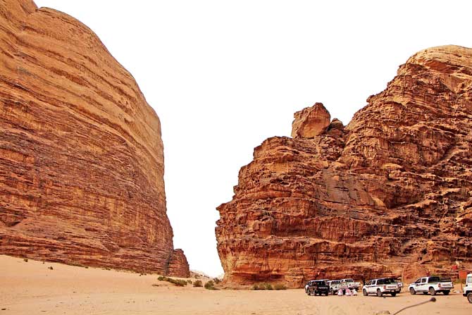 Wadi Rum has a maze of monolithic rockscapes that rise up from the desert floor up to a height of 1,750 mt