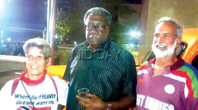 West Indies legend Clive Lloyd (centre) poses with fans
