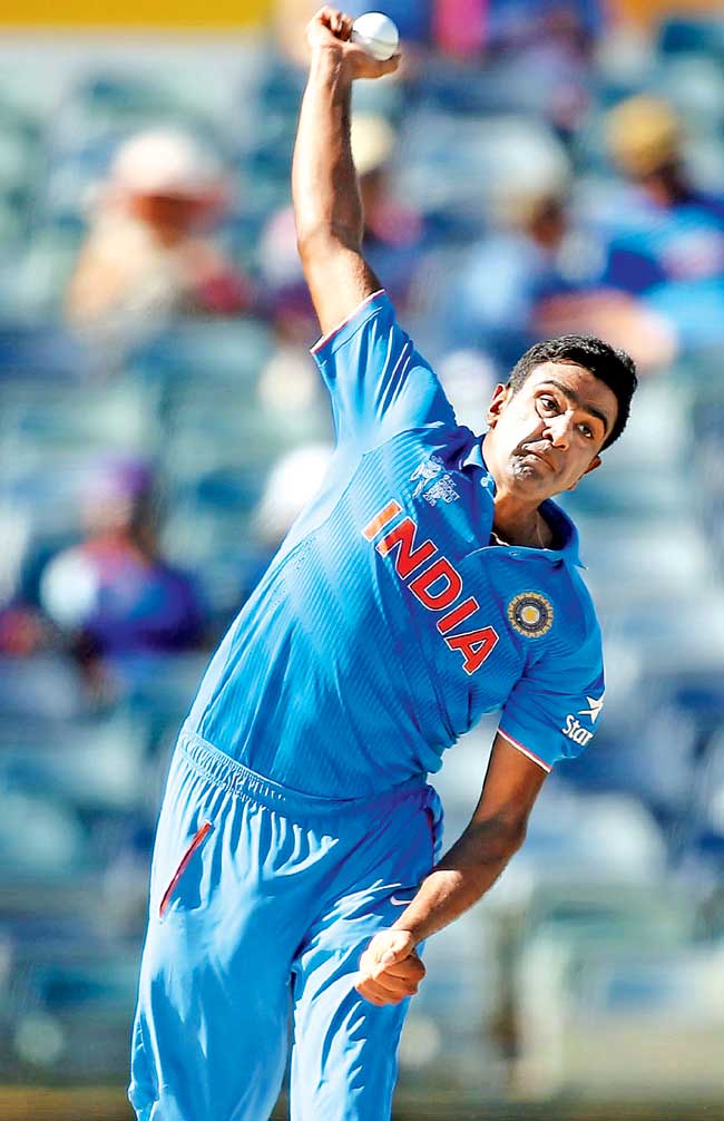 India off-spinner Ravichandran Ashwin bowls against UAE on Saturday. Pic/Getty Images