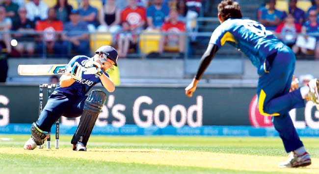 Jos Buttler evades a beamer from Suranga Lakmal yesterday. Pic/AFP