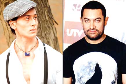 What has kept Tiger Shroff from catching up with neighbour Aamir Khan?