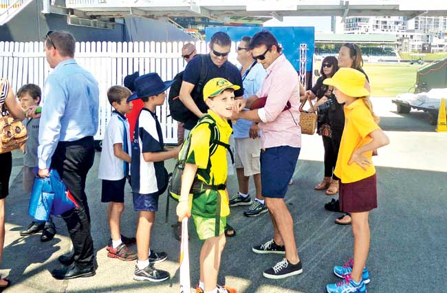 Adam Gilchrist obliges fans with autographs at the WACA yesterday
