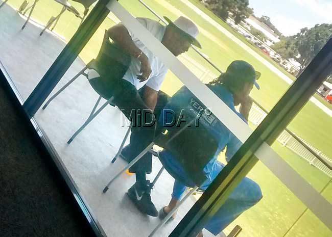 WI chief selector Clive Lloyd (left) has a one-on-one chat with Chris Gayle during a practice session at the Murdoch University Oval in Perth yesterday. Pic/Ashwin Ferro