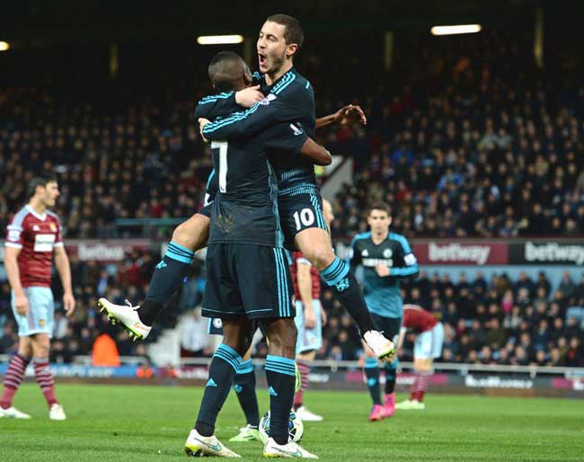 Chelsea-s Belgian midfielder Eden Hazard centre R celebrates with Chelsea-s Brazilian midfielder Ramires after scoring the opening goal of the English Premier League football match between West Ham United and Chelsea at the Boleyn Ground in Upton Park, East London. Pic/AFP
