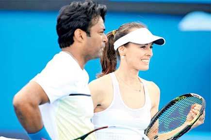 Paes-Hingis present Aus Open winning racquets to PM Modi
