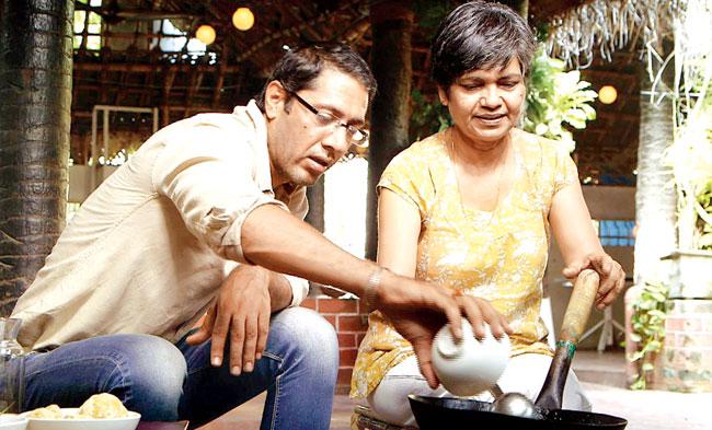 Aditya Bal cooks with a local  family in Pondicherry