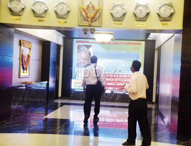 Investors look expectantly at the screens at Dalal Street as the markets react to the Union Budget