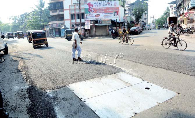 A road with a shoddy patch-up job in Dombivli