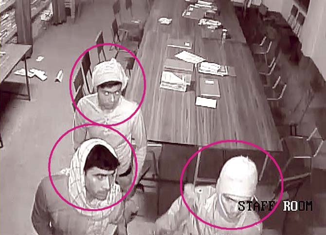 A still from the CCTV footage showing three of the accused. Pics/PTI