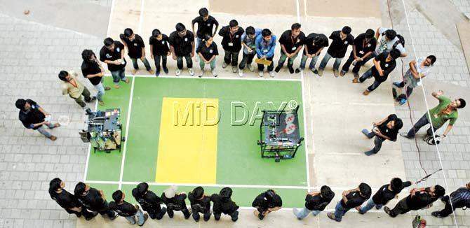 Students of KJ Somaiya College demonstrate the robots playing badminton. Pic/Shadab Khan