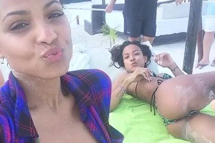 Chris Brown slams Karrueche Tran for posting sexy bikini pic