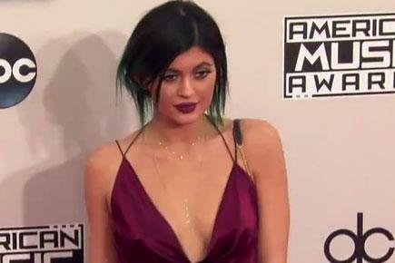 Kylie Jenner flaunts her assets for magazine cover