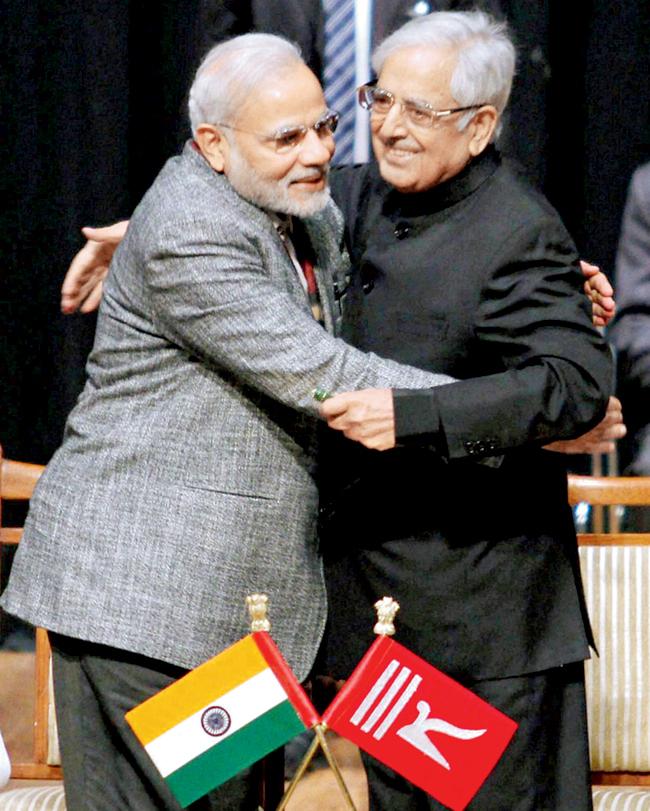 Modi’s (left) innings will be defined by the power sharing govt in Kashmir with Mufti (right). 